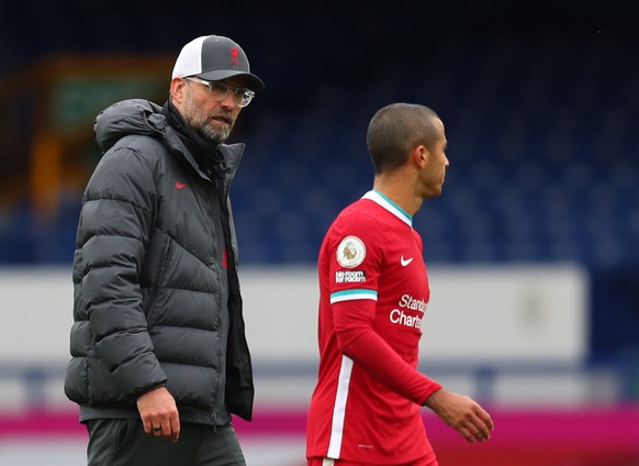 Soccer Football - Premier League - Everton v Liverpool - Goodison Park, Liverpool, Britain - October 17, 2020 Liverpool manager Juergen Klopp and Thiago Alcantara after the match Pool via REUTERS/Cath ...