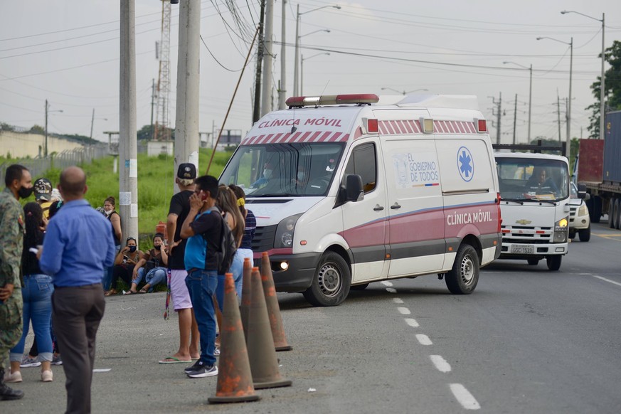 An ambulance enters the Guayaquil prison after acts of violence that left inmates dead, in Guayaquil, Ecuador, 23 February 2021. More than 60 inmates died this Tuesday in Ecuador in a chain of violent ...