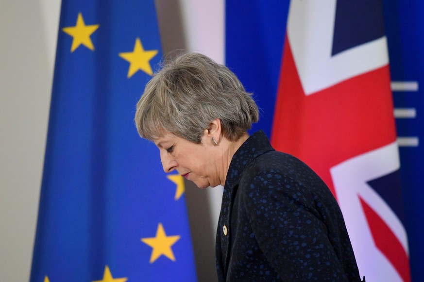 FILE PHOTO: Britain&#039;s Prime Minister Theresa May leaves after giving a news briefing in Brussels, Belgium, March 22, 2019. REUTERS/Toby Melville/File Photo
