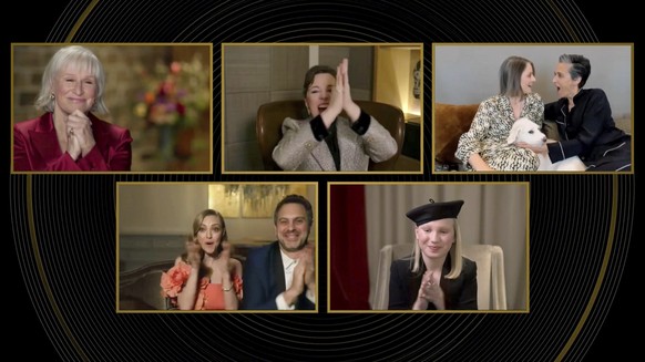 In this video grab issued Sunday, Feb. 28, 2021, by NBC, Jodie Foster, pictured top right holding her dog Ziggy, accepts the award for best supporting actress in a motion picture for &quot;The Maurita ...