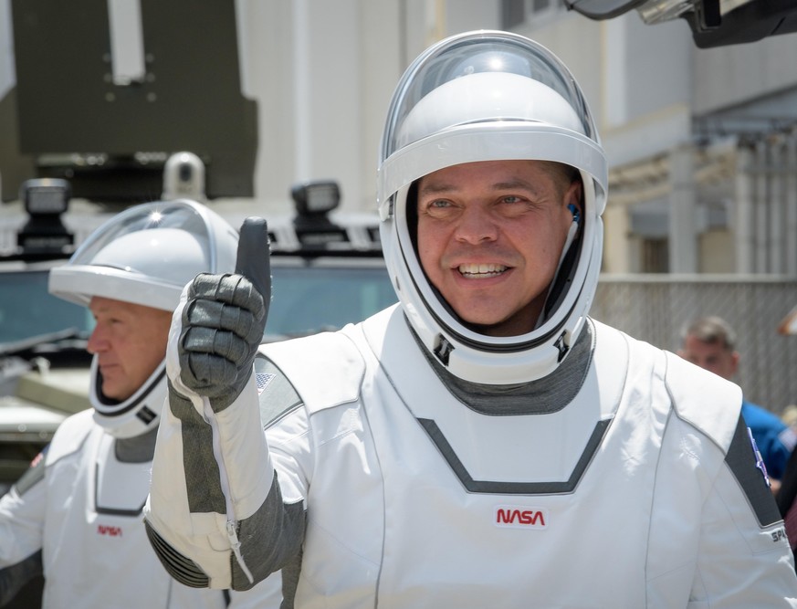 (200530) -- CAPE CANAVERAL (U.S.), May 30, 2020 () -- NASA astronauts Bob Behnken (front) and Doug Hurley depart for Launch Complex 39A at NASA&#039;s Kennedy Space Center in Florida, the United State ...