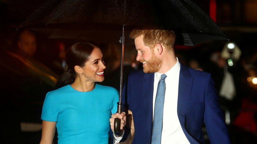 FILE PHOTO: Britain&#039;s Prince Harry and his wife Meghan, Duchess of Sussex, arrive at the Endeavour Fund Awards in London, Britain March 5, 2020. REUTERS/Hannah McKay/File Photo