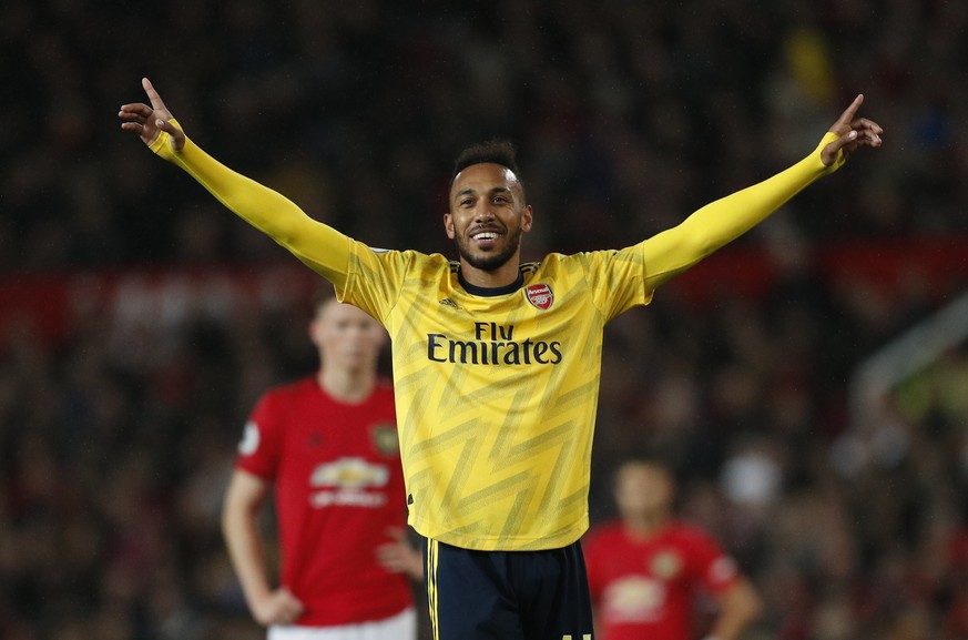 Pierre-Emerick Aubameyang of Arsenal celebrates scoring the equalising goal during the Premier League match at Old Trafford, Manchester. Picture date: 30th September 2019. Picture credit should read:  ...