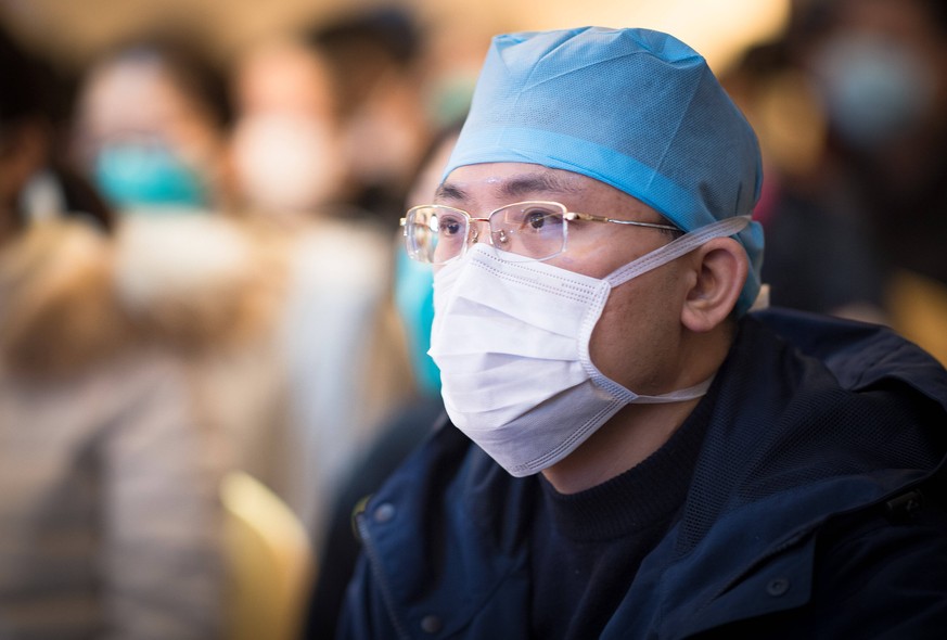 200125 -- WUHAN, Jan. 25, 2020 -- A medical staff member from Guangdong Province attends a training in Wuhan, central China s Hubei Province, Jan. 25, 2020. Medical staff members from Guangdong arrive ...
