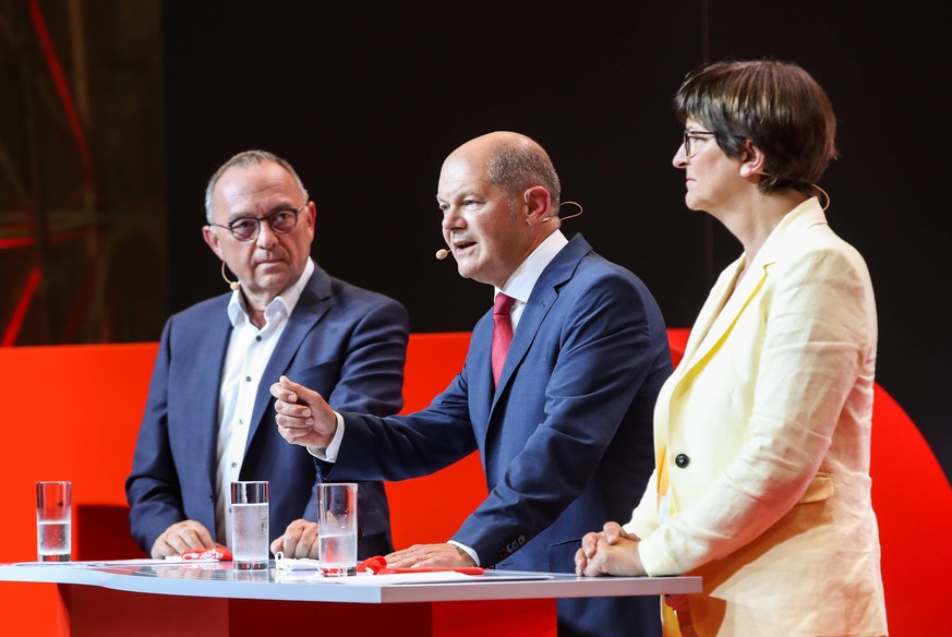 200810 -- BERLIN, Aug. 10, 2020 -- German Vice Chancellor and Finance Minister Olaf Scholz C and leaders of German Social Democratic Party SPD Norbert Walter-Borjans L, Saskia Esken attend a press con ...