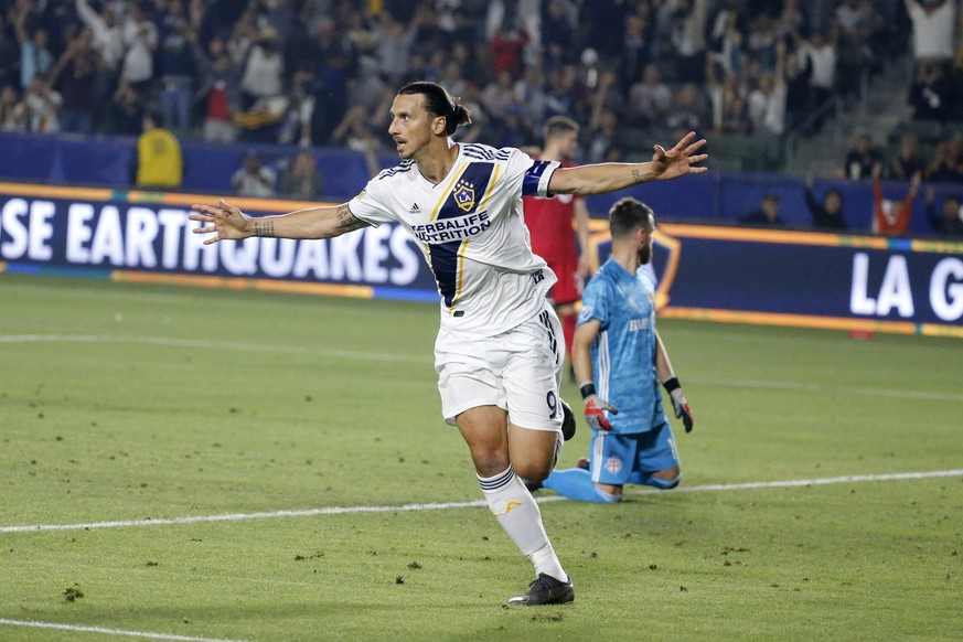 FILE - In this July 4, 2019, file photo, LA Galaxy forward Zlatan Ibrahimovic (9) celebrates scoring a goal during the second half of the team&#039;s MLS soccer match against Toronto FC in Carson, Cal ...
