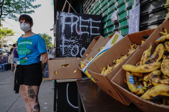 A view of Knickerbocker Free Food Fridge in Brooklyn offering frozen goods, fresh fruits and vegetables, books and diapers during the coronavirus pandemic on May 16, 2020 in New York City. COVID-19 ha ...