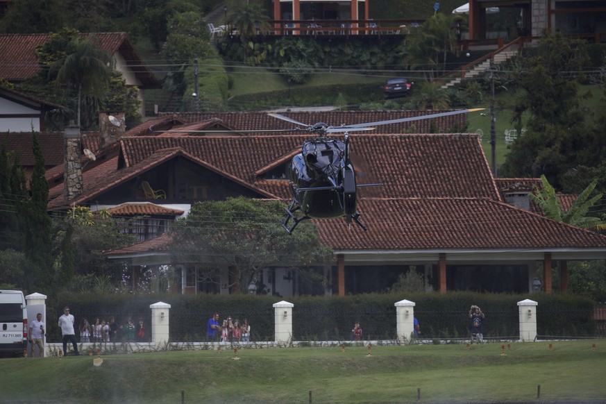 A helicopter transporting Brazil&#039;s soccer player Neymar arrives to the Granja Comary training center, ahead of the Copa America tournament, in Teresopolis, Saturday, May 25, 2019. (AP Photo/Silvi ...