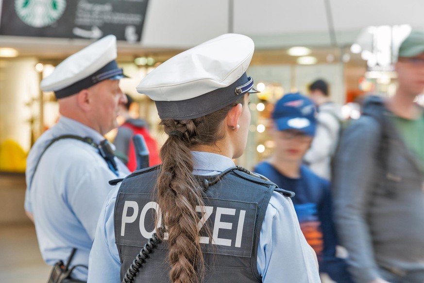 BERLIN, GERMANY - APRIL 20, 2019: Police patrol in Tegel airport. Police on high terror alert warned to be hyper vigilant. Berlin is the capital and largest city of Germany by both area and population