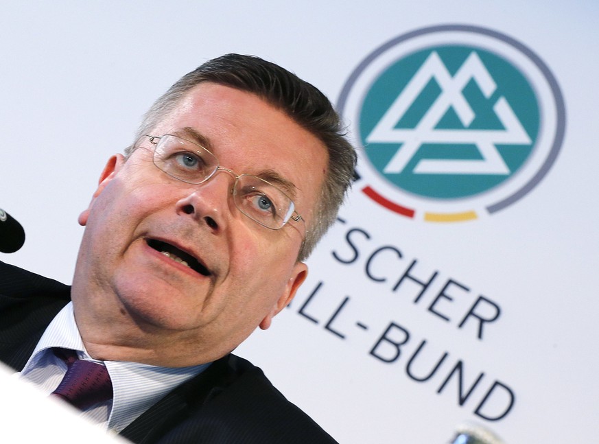 FILE---President of German football federation, DFB, Reinhard Grindel speaks during a finance press conference of the DFB in Frankfurt, Germany, Thursday, June 2, 2016. (AP Photo/Michael Probst)