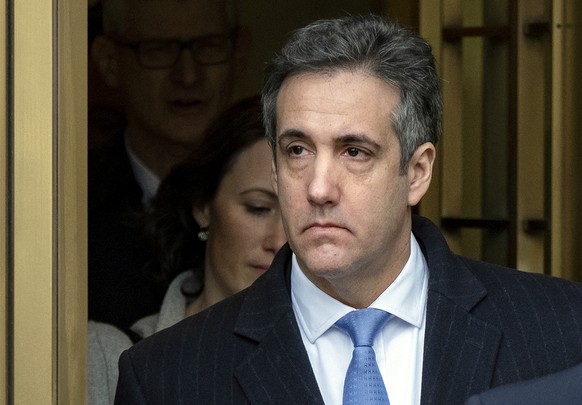 FILE- In this Dec. 12, 2018 file photo, President Donald Trump&#039;s former lawyer, Michael Cohen, leaves federal court in New York after being sentenced to three years in prison. Cohen was furloughe ...
