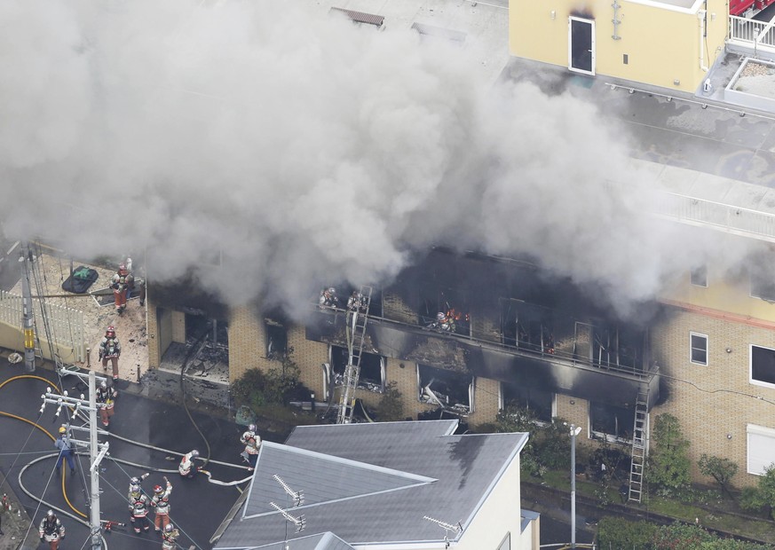 An aerial photo shows the fire site burning with fire in Kyoto on July 18, 2019. On the morning of 18th, a fire occurred with an explosion sound at a studio of an animation production company &quot;Ky ...