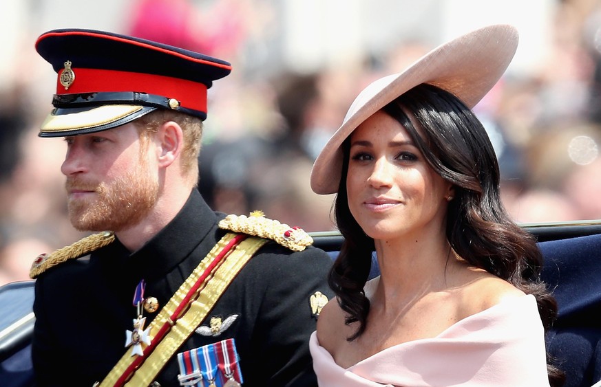 LONDON, ENGLAND - JUNE 09: Meghan, Duchess of Sussex and Prince Harry, Duke of Sussex during Trooping The Colour on the Mall on June 9, 2018 in London, England. The annual ceremony involving over 1400 ...