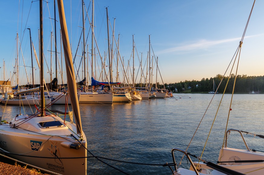 Aland Islands, Finland - July 12, 2019 - View of the embankment with yachts on the Aland Islands. Coast of the Baltic Sea.