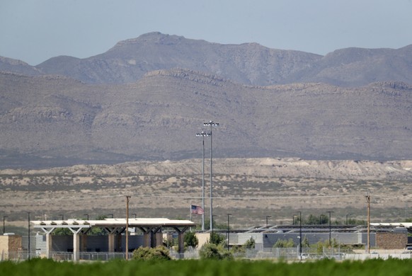 Mexico backdrops the Fabens Port-of-Entry which houses tent shelters used to hold separated migrant family members along the International border, Friday, June 22, in Fabens, Texas. The U.N human righ ...