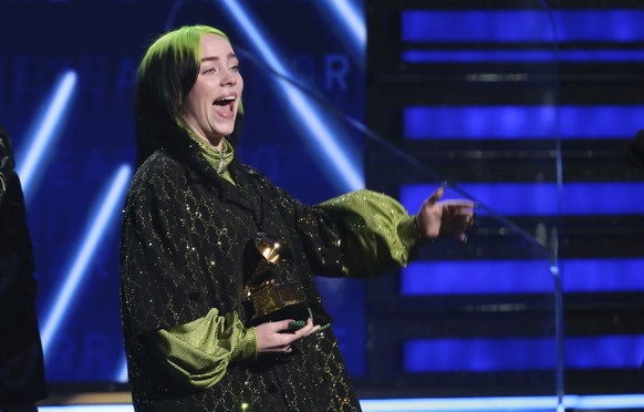 Billie Eilish accepts the award for record of the year for &quot;Bad Guy&quot; at the 62nd annual Grammy Awards on Sunday, Jan. 26, 2020, in Los Angeles. (Photo by Matt Sayles/Invision/AP)