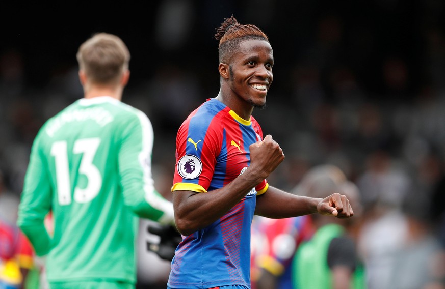 Soccer Football - Premier League - Fulham v Crystal Palace - Craven Cottage, London, Britain - August 11, 2018 Crystal Palace&#039;s Wilfried Zaha celebrates after the match Action Images via Reuters/ ...