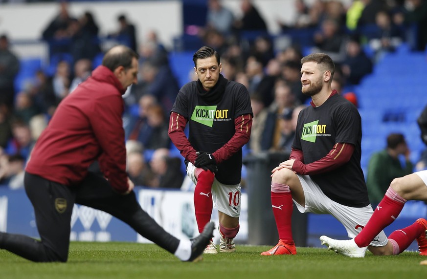 Mesut Ozil of Arsenal warms up alongside Sead Kolasinac of Mustafi the Premier League match at Goodison Park, Liverpool. Picture date: 7th April 2019. Picture credit should read: Andrew Yates/Sportima ...