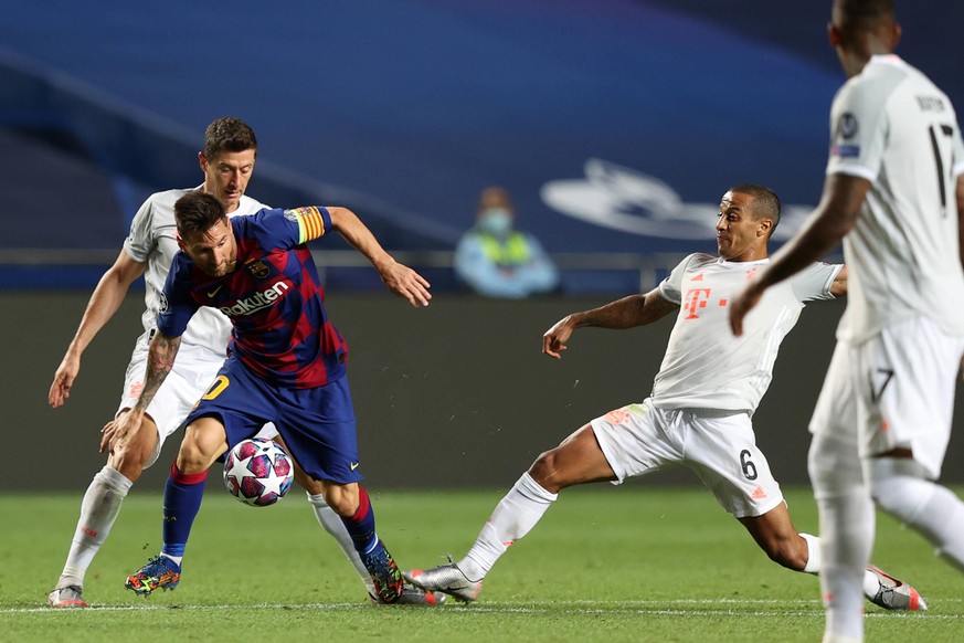 Lionel Messi, Thiago und Robert Lewandowski kämpfen im Champions-League-Halbfinale um den Ball.