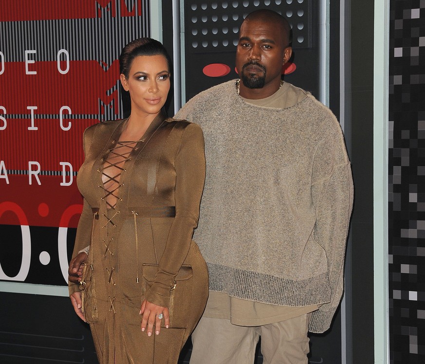 **FILE PHOTO** Kim Kardashian and Kanye West Reportedly Headed For Divorce. LOS ANGELES - AUGUST 30: Kim Kardashian and Kanye West at the 2015 MTV Video Music Awards at the Microsoft Theater on August ...