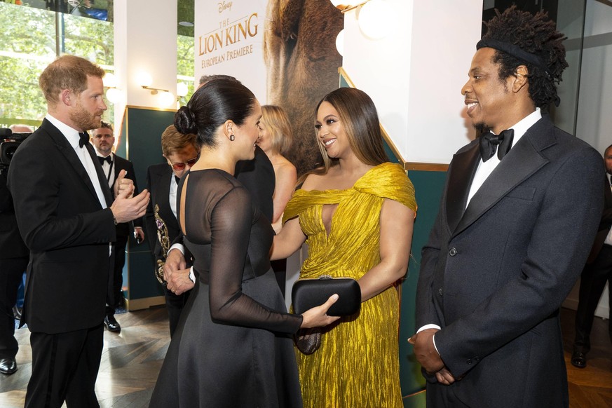 . 14/07/2019. London, United Kingdom. Prince Harry, the Duke of Sussex and Meghan Markle The Duchess of Sussex with Beyonce at the premiere of The Lion King in London . PUBLICATIONxINxGERxSUIxAUTxHUNx ...