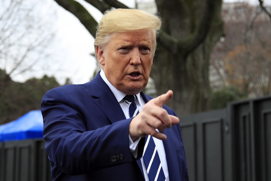 President Donald Trump speaks to the media as he leaves the White House, Tuesday, March 3, 2020, in Washington, to visit the National Institutes of Health&#039;s Vaccine Research Center in Bethesda, M ...
