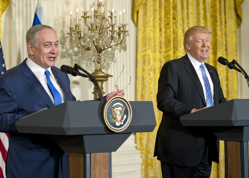 United States President Donald J. Trump, right, holds a joint press conference with Prime Minister Benjamin Netanyahu of Israel, left, in the East Room of the White House in Washington, DC on Wednesda ...