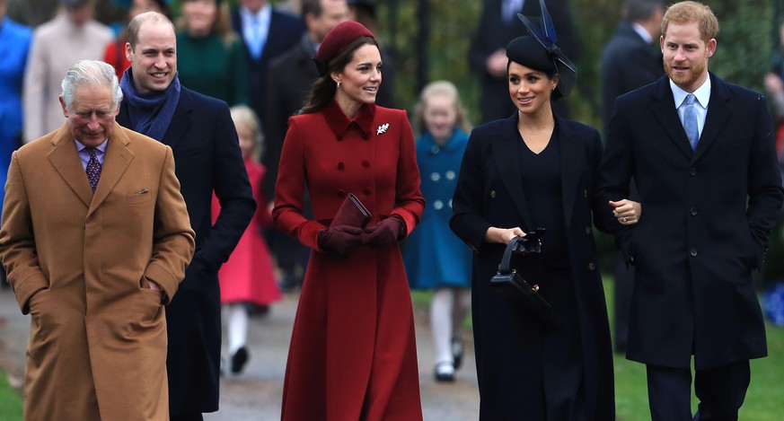 KING&#039;S LYNN, ENGLAND - DECEMBER 25: (L-R) Prince Charles, Prince of Wales, Prince William, Duke of Cambridge, Catherine, Duchess of Cambridge, Meghan, Duchess of Sussex and Prince Harry, Duke of  ...