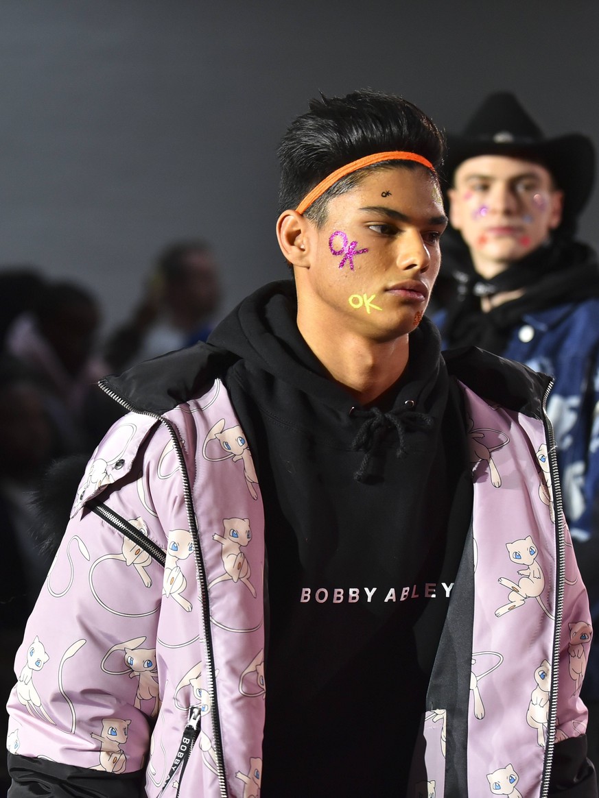 January 5, 2019 - London, United Kingdom - A model walks the runway at the Bobby Abley show during London Fashion Week Men s January 2018 at BFC Show Space on January 8, 2018 in London, England. Londo ...