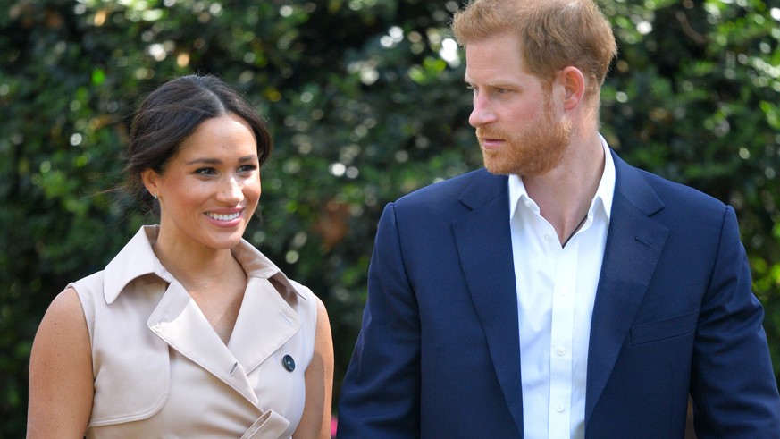 FILE - In this Oct. 2, 2019, file photo, Britain&#039;s Prince Harry and Meghan Markle appear at the Creative Industries and Business Reception at the British High Commissioner&#039;s residence in Joh ...