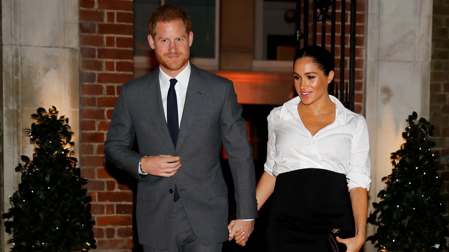 FILE PHOTO: Britain&#039;s Prince Harry and Meghan, Duchess of Sussex, arrive to attend the Endeavour Fund Awards in the Drapers&#039; Hall in London, Britain February 7, 2019. Tolga Akmen/Pool via RE ...