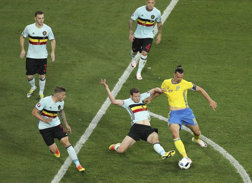 FILE - In this Wednesday, June 22, 2016 filer, Sweden&#039;s Zlatan Ibrahimovic, right, is challenged by Belgium&#039;s Jan Vertonghen during the Euro 2016 Group E soccer match between Sweden and Belg ...