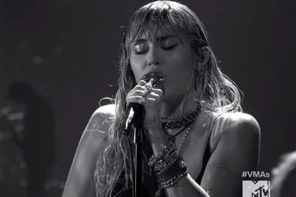 Miley Cyrus VMA performance and tattoo

Credit: MTV
