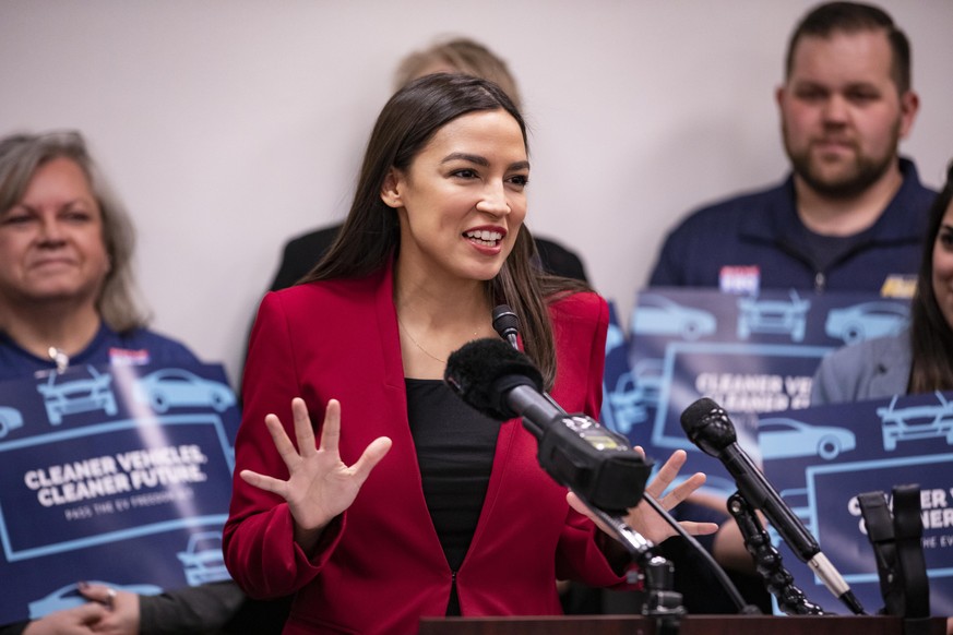 WASHINGTON, DC - FEBRUARY 06: Rep. Alexandria Ocasio-Cortez (D-NY) speaks during a press conference with Rep. Andy Levin (D-MI) about their new bill called the EV Freedom Act on Capitol Hill on Februa ...