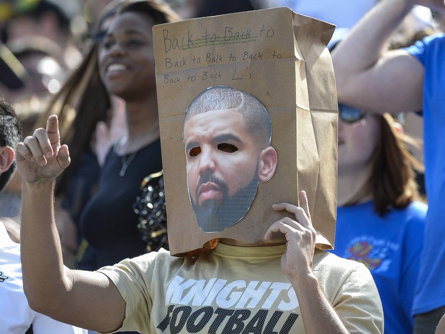 October 24, 2015 - Orlando, FL, U.S: UCF Knights fan wears a bag with a picture of Drake during 1st half NCAA College League USA football game action between the Houston Cougars and the UCF Knights at ...