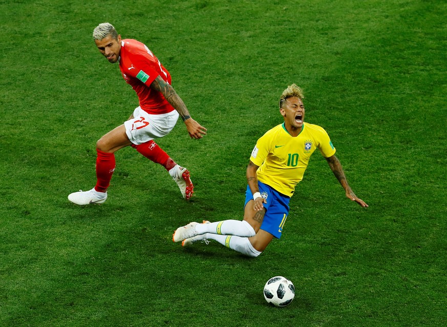 Soccer Football - World Cup - Group E - Brazil vs Switzerland - Rostov Arena, Rostov-on-Don, Russia - June 17, 2018 Switzerland&#039;s Valon Behrami in action with Brazil&#039;s Neymar REUTERS/Jason C ...