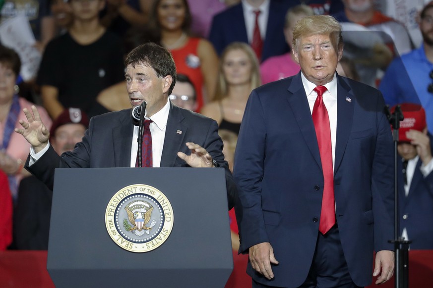 President Donald Trump, right, stands beside 12th Congressional District Republican candidate Troy Balderson, left, during a rally, Saturday, Aug. 4, 2018, in Lewis Center, Ohio. (AP Photo/John Minchi ...