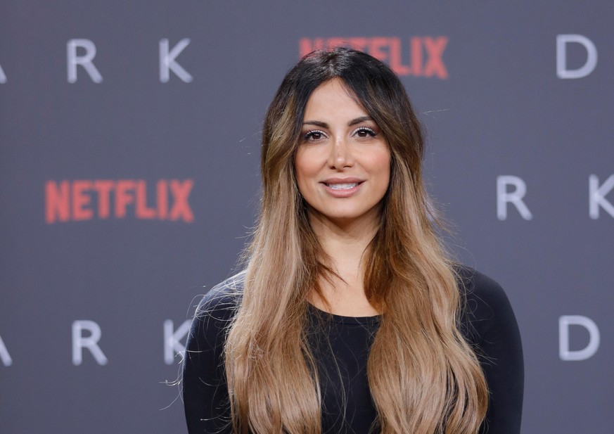 BERLIN, GERMANY - NOVEMBER 20: Enissa Amani attends the premiere of the first German Netflix series &#039;Dark&#039; at Zoo Palast on November 20, 2017 in Berlin, Germany. (Photo by Andreas Rentz/Gett ...