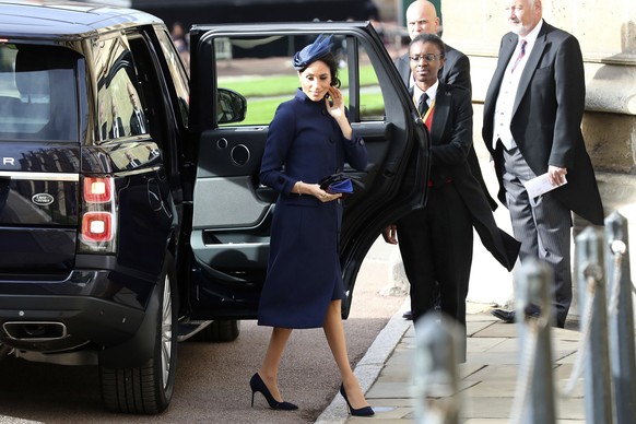 Meghan, Duchess of Sussex arrives ahead of the wedding of Princess Eugenie of York and Jack Brooksbank at St George’s Chapel, Windsor Castle, near London, England, Friday Oct. 12, 2018. (Gareth Fuller ...