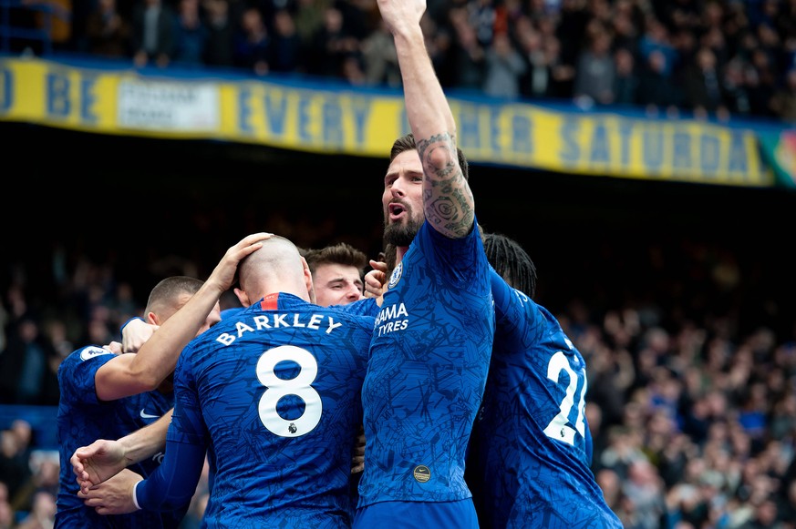 Olivier Giroud of Chelsea celebrates the goal scored by Marcos Alonso of Chelsea during the Premier League match between Chelsea and Tottenham Hotspur at Stamford Bridge, London, England on 22 Februar ...