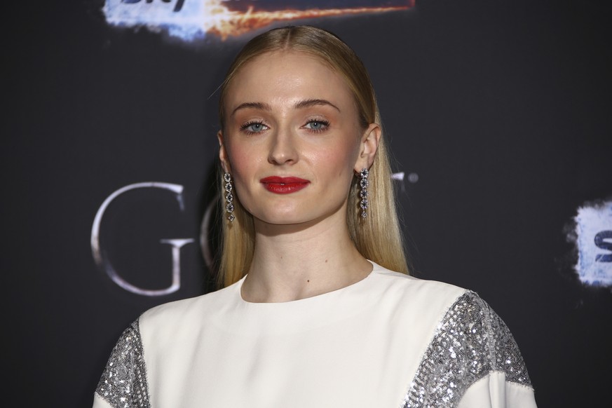 Actress Sophie Turner poses for photographers at the premiere of season eight of the television show &#039;Game of Thrones&#039; in Belfast, Northern Ireland, Friday, April 12, 2019. (Photo by Joel C  ...