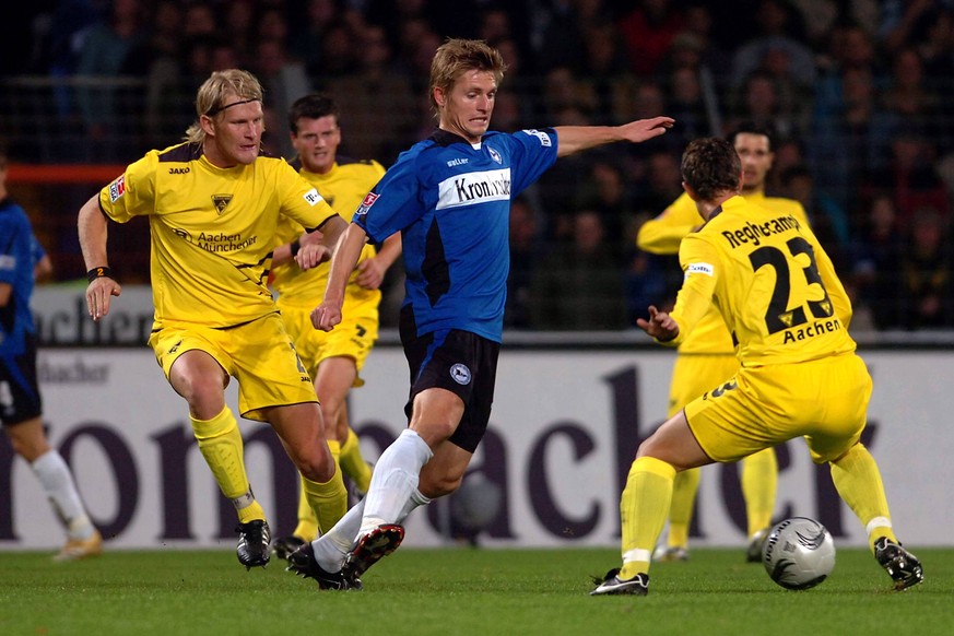 Im Jahr 2006 hieß Mittelmäßigkeit in der Bundesliga noch Arminia Bielefeld gegen Alemannia Aachen. Artur Wichniarek (M.), Laurentiu Aurelian Reghecampf (r.) und Sascha Rösler – lasst euch die (Vereins ...
