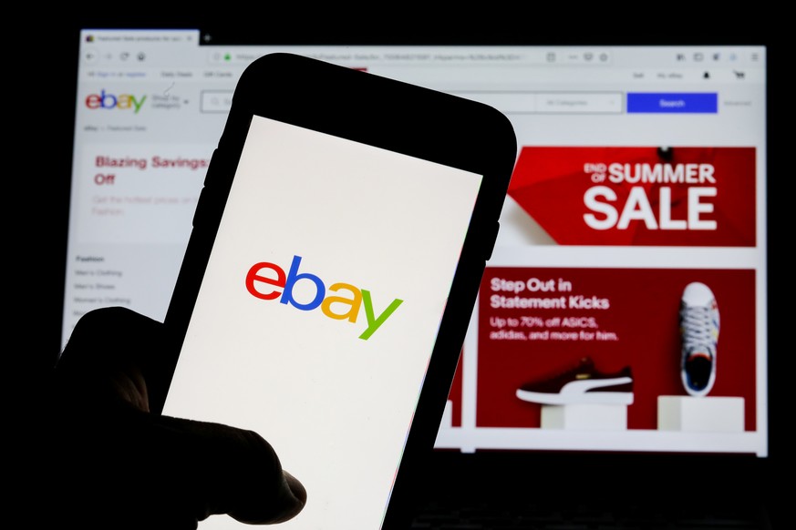 The eBay logo is pictured on a phone screen in this photo illustration in New York, U.S., July 23, 2019. REUTERS/Brendan McDermid/Illustration