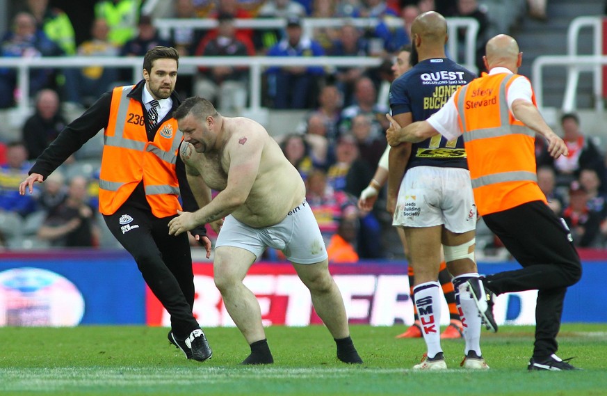 Castleford Tigers v Leeds Rhinos Betfred Super League Dacia Magic Weekend A streaker enter the field and is tackled to the ground by a stadium steward during Castleford Tigers vs Leeds Rhinos during t ...