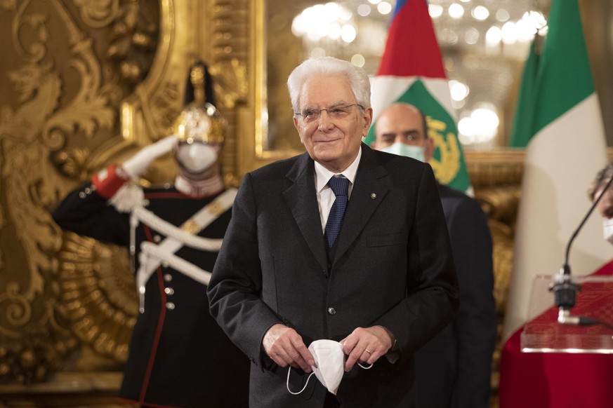 Italian President Sergio Mattarella leaves after talking to the media at the Quirinale presidential palace in Rome Friday, Jan. 29, 2021. Italian Premier Giuseppe Conte resigned after a key coalition  ...