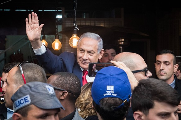 (190408) -- JERUSALEM, April 8, 2019 -- Israeli Prime Minister and Chairman of the Likud Party Benjamin Netanyahu (C) tours the Mahane Yehuda market during the final stage of his election campaign in  ...