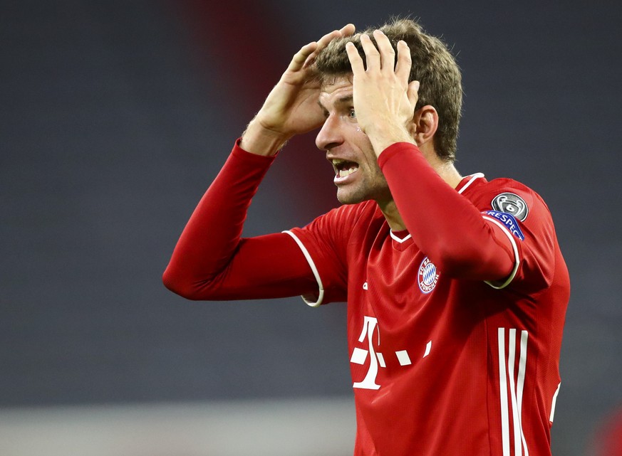 Bayern Munich&#039;s Thomas Müller reacts during the Champions League Group A soccer match between Bayern Munich and Atletico Madrid at the Allianz Arena in Munich, Germany, Wednesday, Oct. 21, 2020.  ...