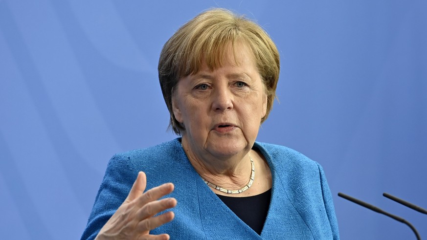 German Chancellor Angela Merkel attends a press conference after the informal EU summit and the EU-China summit in Berlin, Germany, Saturday, May 8, 2021. Merkel reiterated her stance that the shortag ...