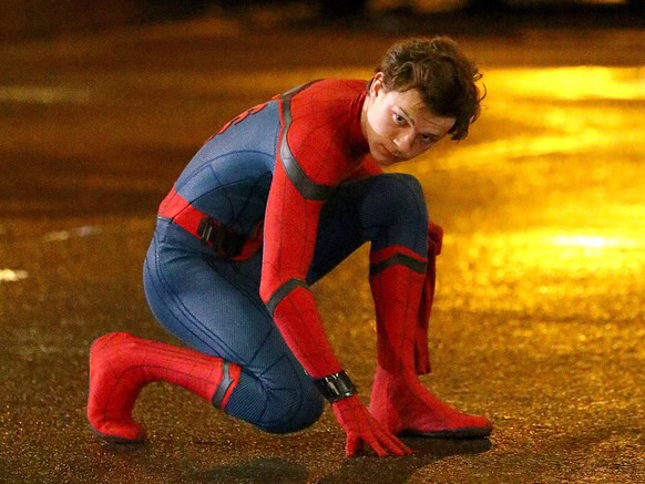 NEW YORK, NY - SEPTEMBER 26: Actor Tom Holland on the Astoria set of the new movie Spiderman: Homecoming on September 26 2016 in New York City....People: Tom Holland. Manhattan United States Of Americ ...