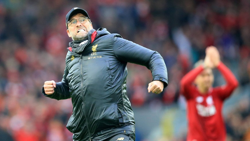 31st March 2019, Anfield, Liverpool, England; EPL Premier League football, Liverpool versus Tottenham Hotspur; Liverpool manager Jurgen Klopp celebrates with a flurry of punches in front of the Kop af ...